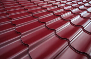 Steel roof painted in red color. Red roof.