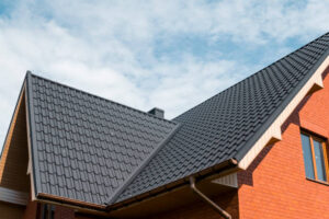 Modern roof covered with tile effect PVC coated brown metal roof sheets